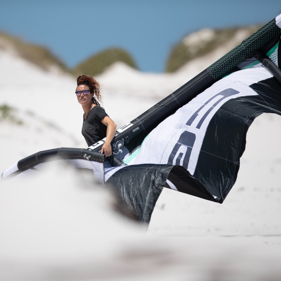 All set for lift-off.  @angelybouillot holding the key to Cape Town’s skies - the XR8.

📸 @supernothing_ofc | <a href="/thomasburblies/">Thomas Burblies</a> 

#ridecore #corekites #kitesurf #kitesurfing #kiteboarding #gokiting #bigair #capetown