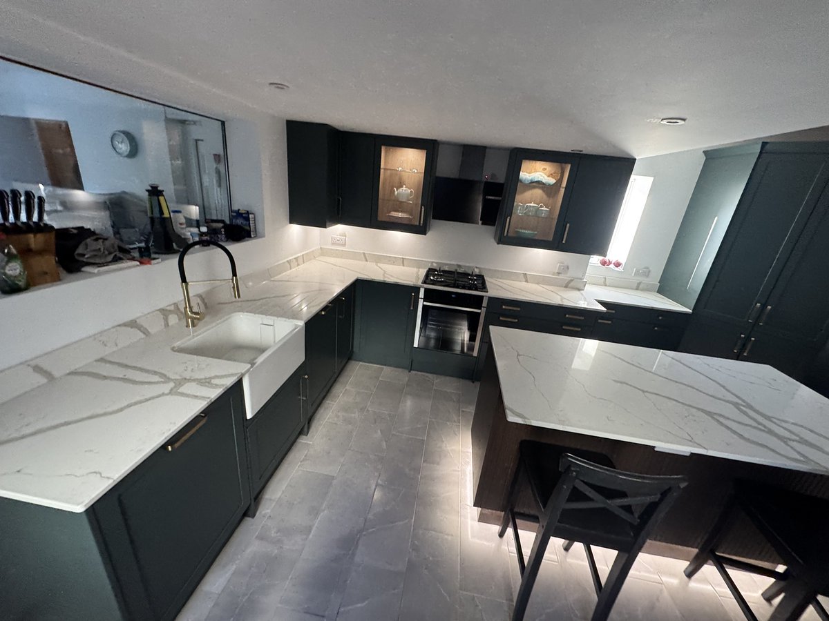 Our last kitchen of 2024 completed after solid surfaces installed. Full <a href="/Wickes/">WICKES</a> installation. Electrics, plumbing, integrated appliances, lighting quartz worktops, Belfast sink, walk in pantry unit and floating island with lighting