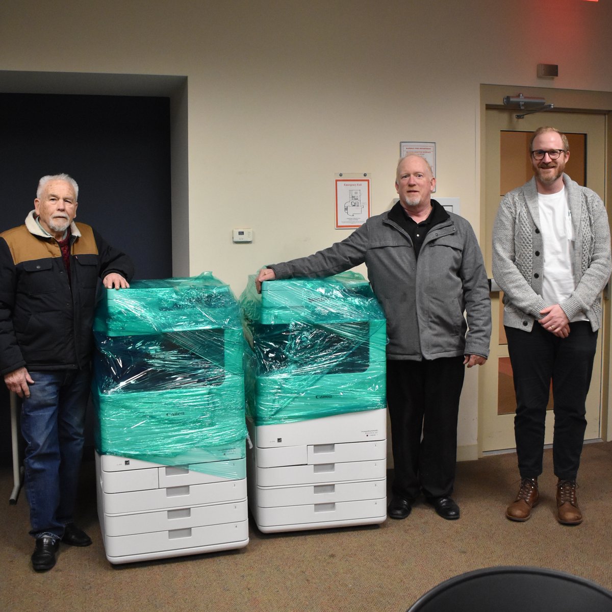 Progress: Library Director Ian Sloat accepts a delivery of 3 copy machines and a VoIP (Voice Over Internet Protocol) phone service, purchased by the City of Rahway.