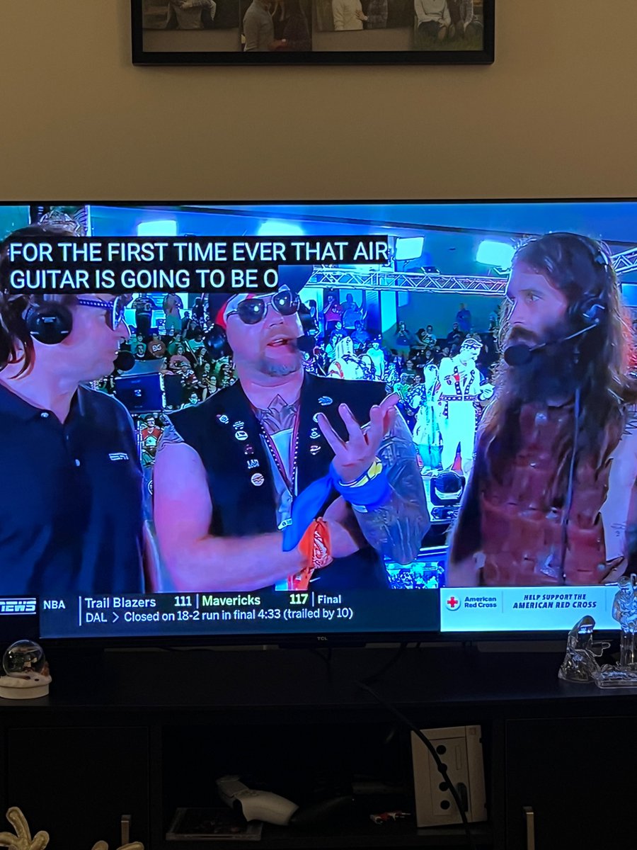 There’s no time to discuss Notre Dame’s win because the US Air Guitar All-Star Air Off just started on ESPNews.