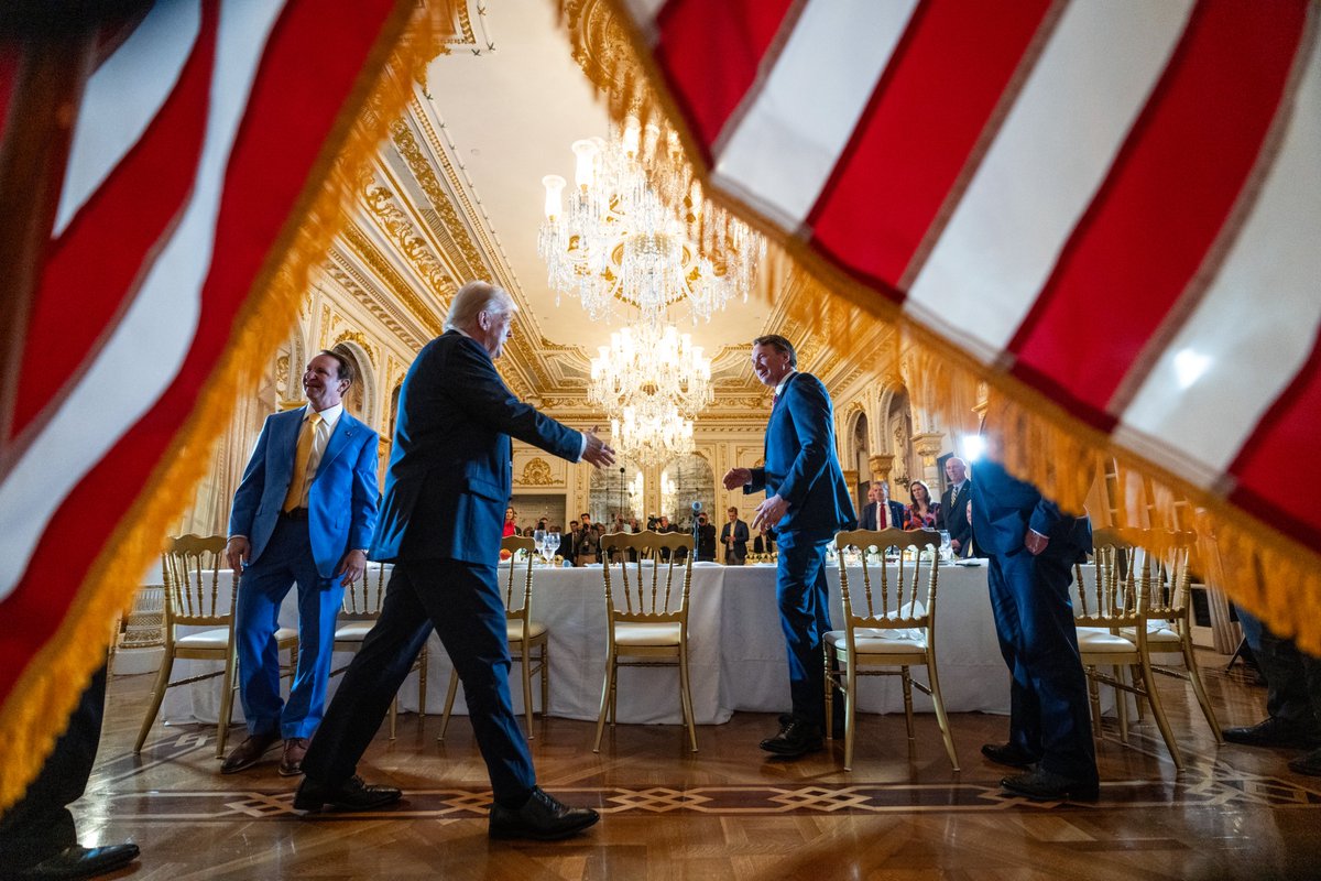 dougmillsnyt's tweet photo. .@realDonaldTrump greets Va. Governor Glenn Youngkin as he host a dinner  for GOP Governors at his Mar-A-Lago Club in Palm Beach. @GovernorVA https://t.co/zOoyCGlOhf