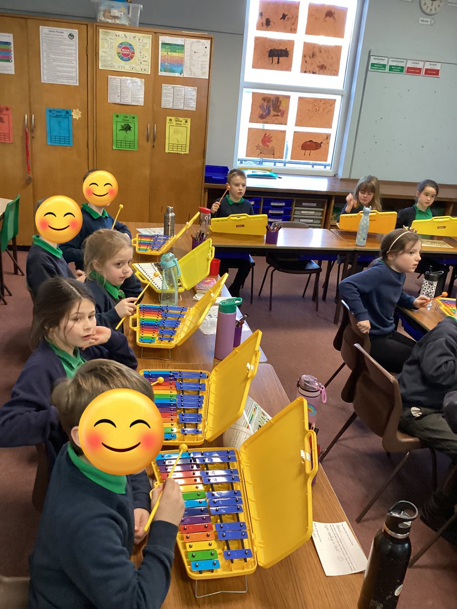 Practising keeping the tempo on the glockenspiels whilst singing at the same time.