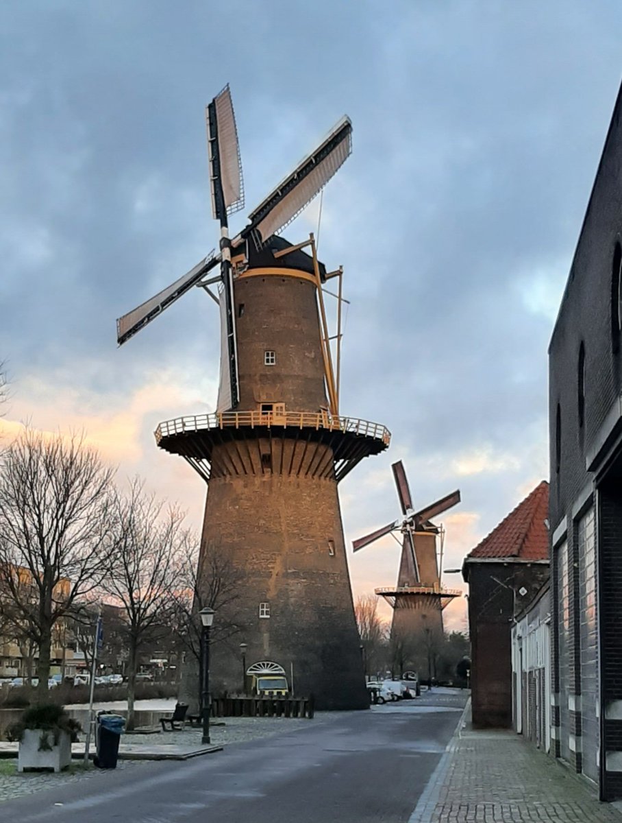 Two of our giant #Windmills turning in the #twilight 😍 
The #windmill nearest is #Molen De Vrijheid (built 1785), and the other is De Noordmolen (built 1803).
We had a sunny but cold day over here in #Schiedam  
#Holland #TheNetherlands 
#NoFilter