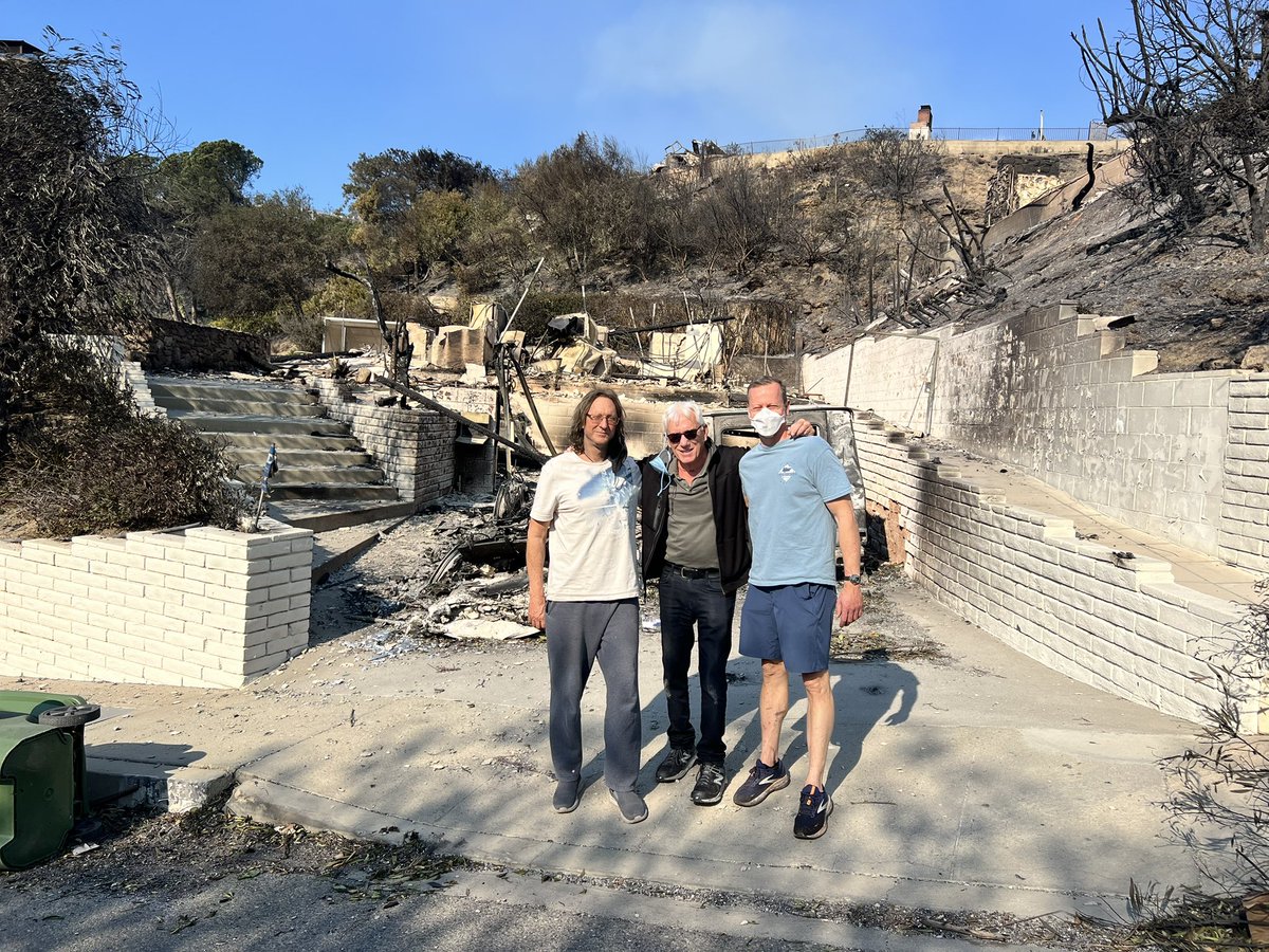 The man on the left, Robert Trinkkeller, is a hero. By the grace of God he stayed behind when the evacuation order was given. When I called the man on the right, our neighbor, in Boston to be sure his 94 year-old father had been evacuated, he was  devastated that a replacement