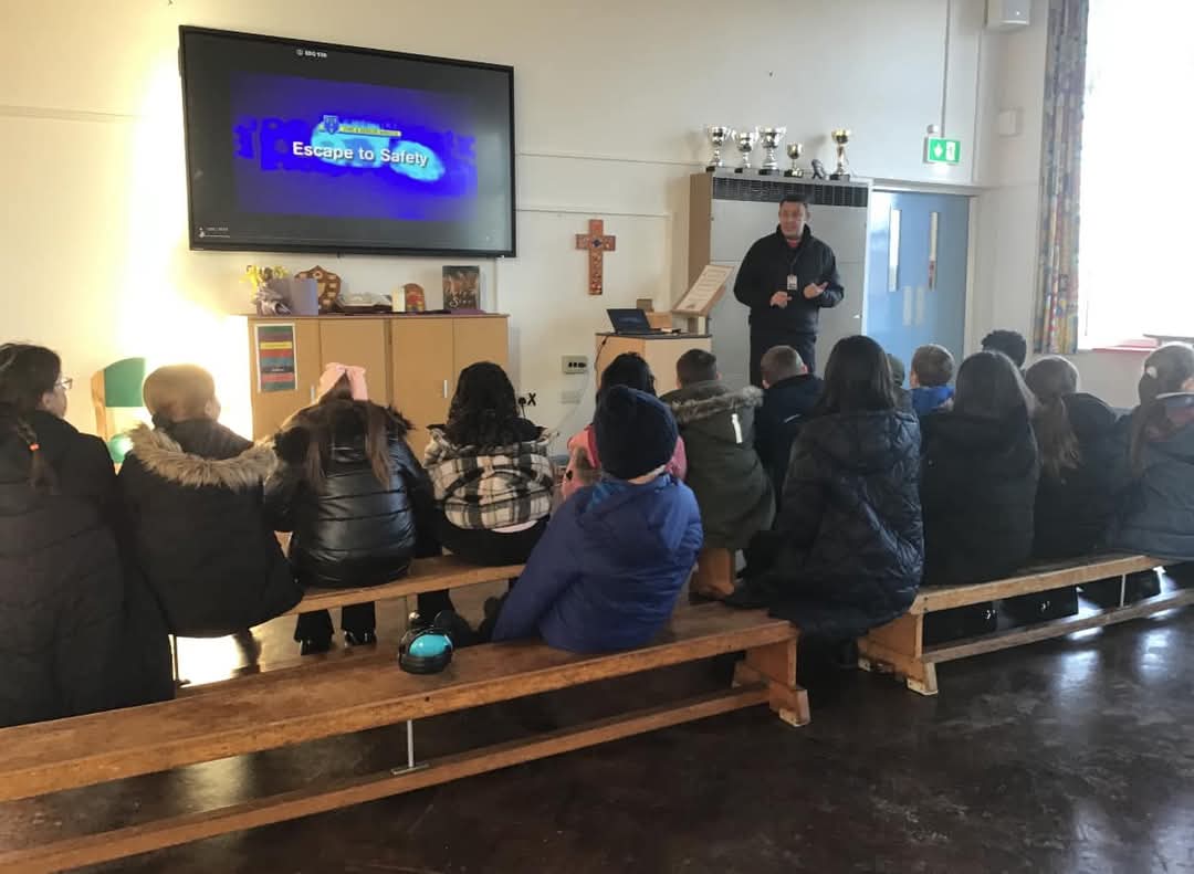 Today, White Watch visited pupils at St. Theresa's Catholic Primary School to deliver a presentation about fire prevention and what to do in the event of a fire.  The students were given a tour of the appliance and had a go in the 'smoke tent' to practice their escape plans!
