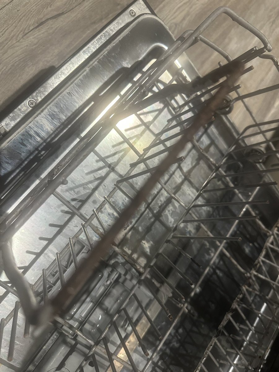 combobular's tweet photo. @HisenseUK our dishwasher is less than 4 years old and the baskets are rusting away to ruins, with pieces falling off regularly. The cost of replacements is most of the cost of a whole new unit. This is a very wasteful model. https://t.co/ksMecHo6dr