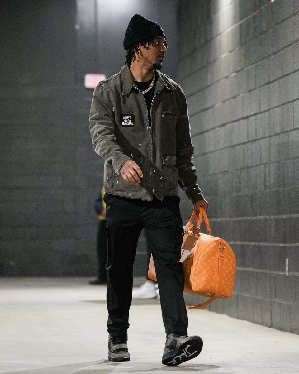 NFL Rookie of the Year Jayden Daniels arrives for his Sunday Night