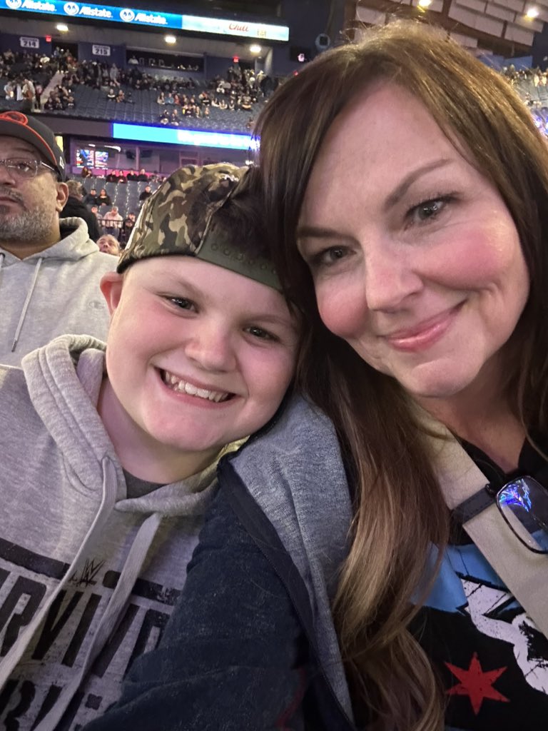SenoraHackett's tweet image. #WWEChicago who loves this more? Ma or son?
