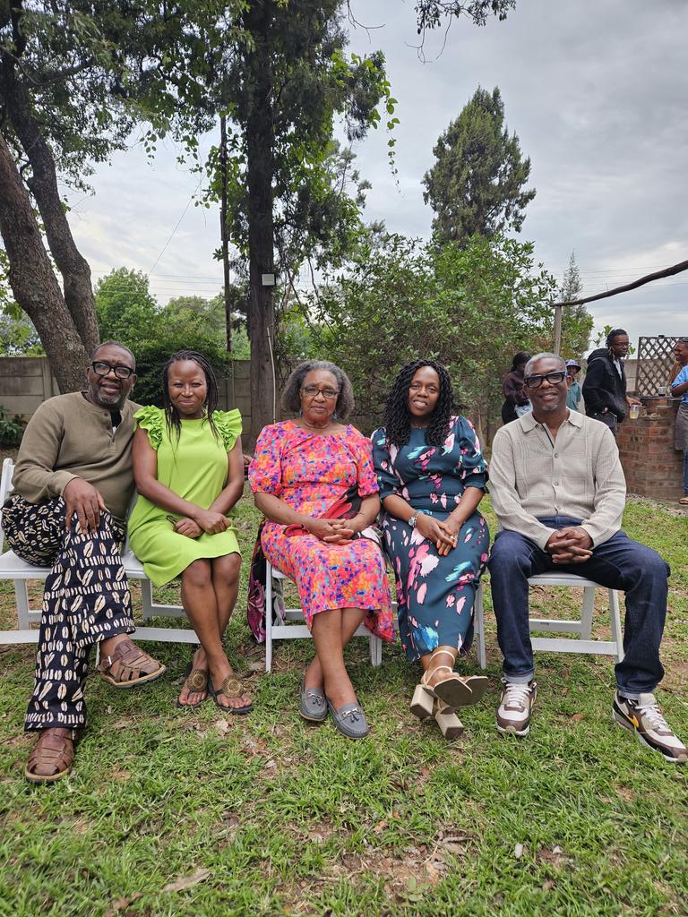 With Prudy, mum, Molly and George Mbofana on Christmas Day