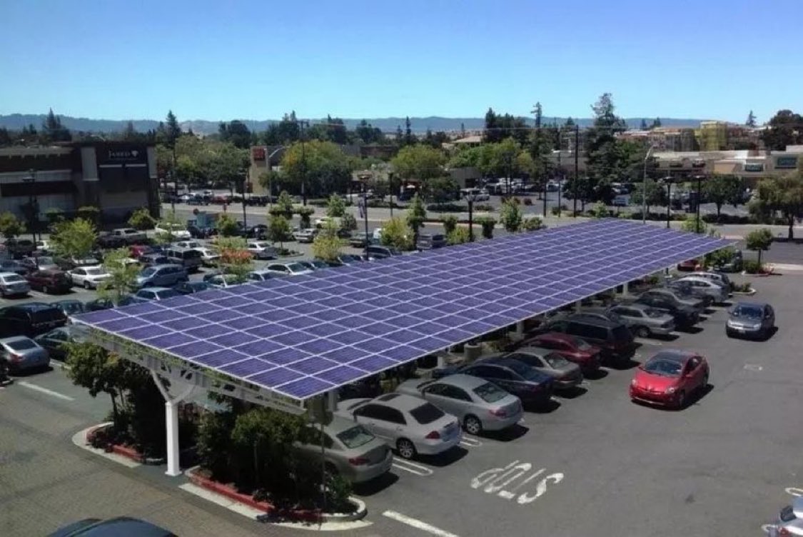JamesMelville's tweet photo. Cover car parks with solar panels rather than plastering them over prime farmland. https://t.co/5w239dslgU