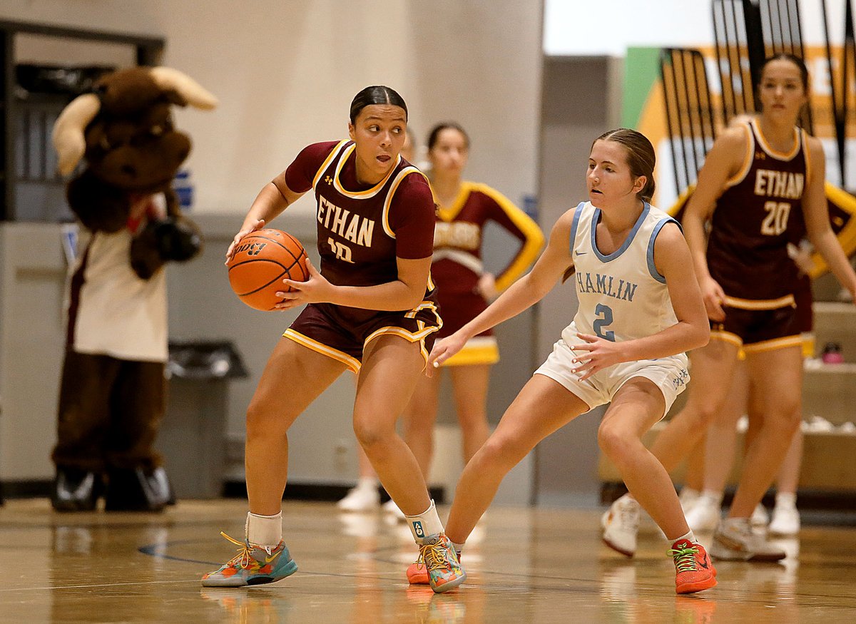 Ethan Rustlers Taziah Hawkins looks to pass the ball  during the first half of the Hoop City Classic Monday, Dec. 30, 2024 at the Corn Palace in Mitchell. Ethan won 49-46 over Hamlin. (Rodney Haas / 605 Sports)