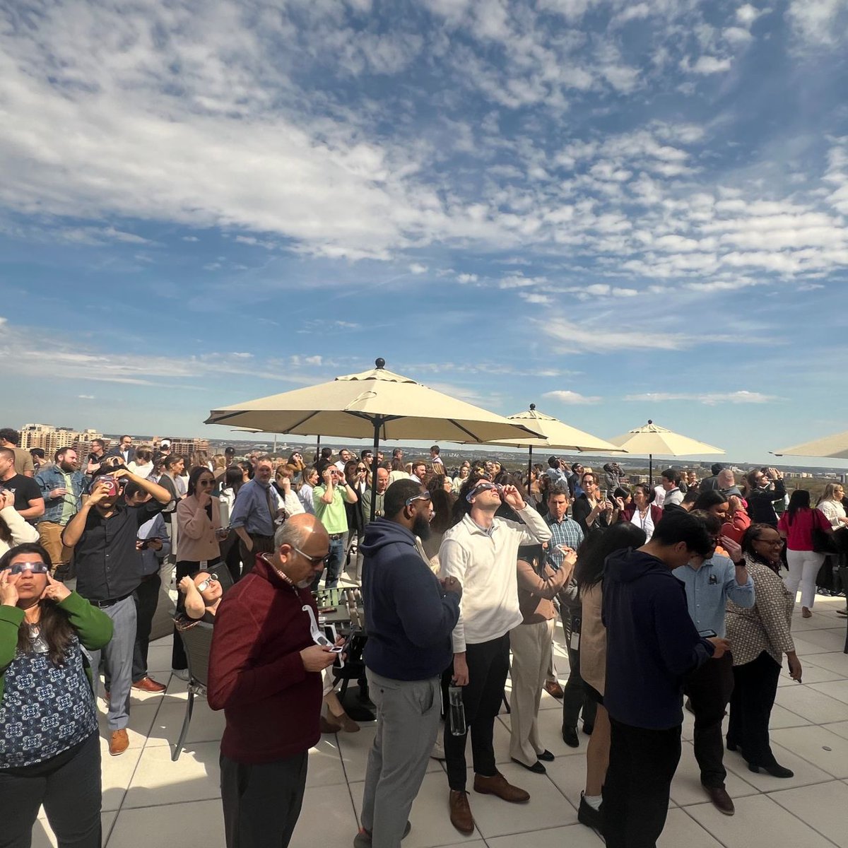 CNA_org's tweet image. 📅 #2024inreview! 📅 
Last April, CNAers and our neighbors had a "totality" awesome time watching #Eclipse2024 from our roof deck.
