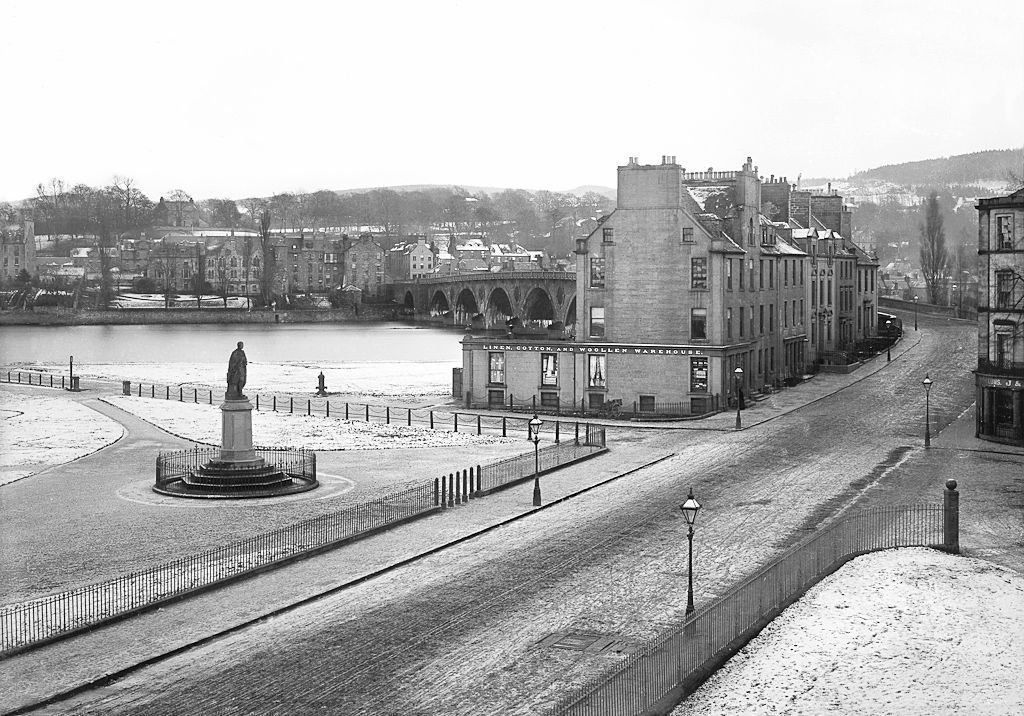 perthartgallery's tweet photo. A late nineteenth-century winter view up Charlotte Street. The store of J. &amp; D. Smith, Linen, Cotton, Woolens and Carpet Warehouse, 13 Charlotte Street, Perth, can be seen on the left, next to the statue of Albert on the North Inch. 

📸 #MagnusJackson https://t.co/WhLlyfGL02