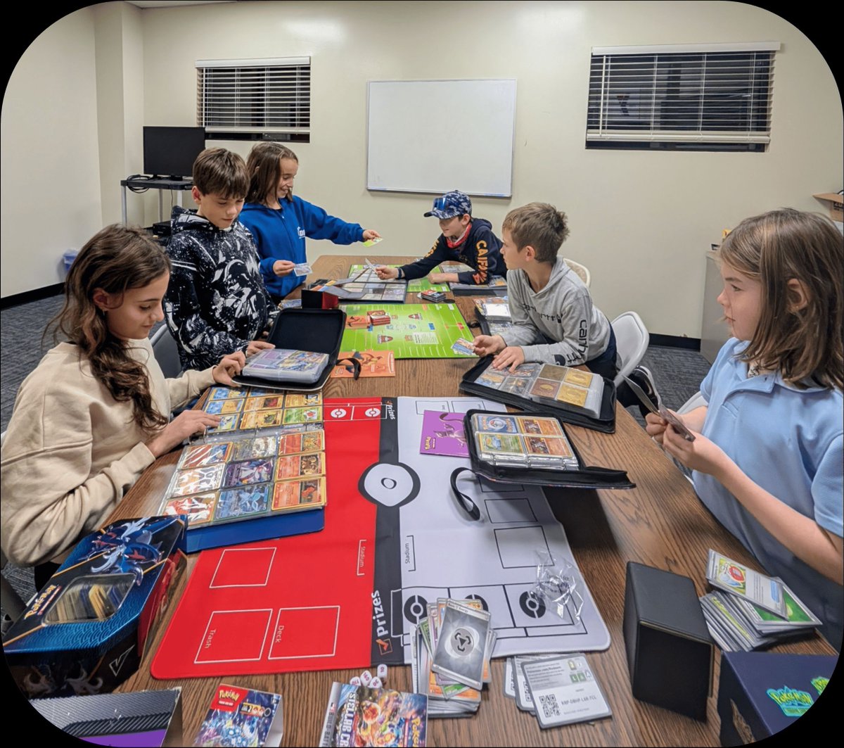 LWTYMCA's tweet photo. Pokémon Game Night at the Lakewood-Trumbull YMCA Program Center! Join us every Monday for Pokémon TCG fun! Bring your cards, play mats, and game accessories to connect with fellow fans. Let's bond over the game we love! https://t.co/hzO73ZcgAL https://t.co/BnbpNsECZI