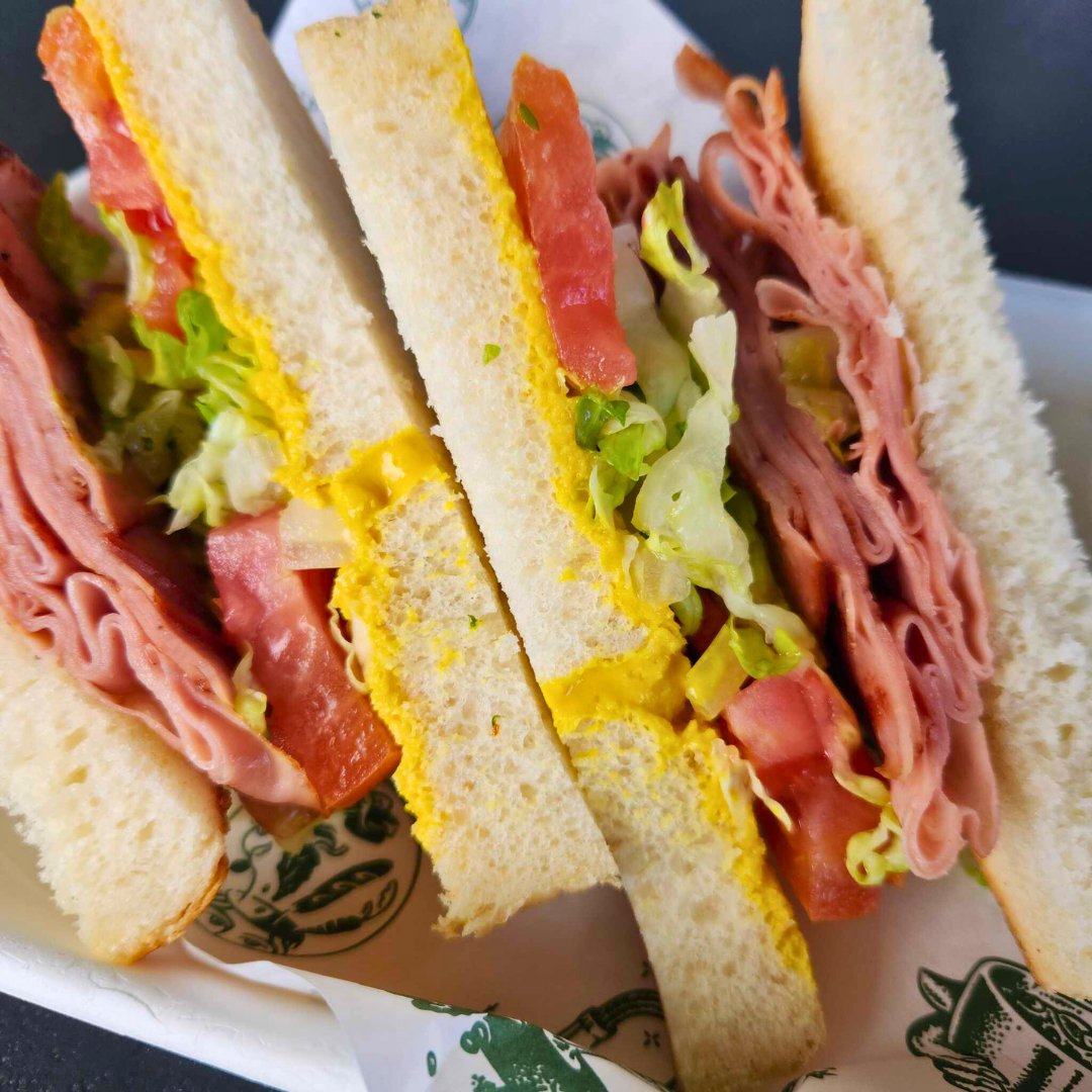 WEEKLY SPECIAL: Arkansas: Fried Bologna - Thin sliced, seared Mortadella, Yellow Mustard, Lettuce, and Tomato on Pan de Mi Bread

Available: December 30th - Jan 4th