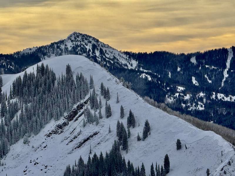 The avalanche danger is HIGH on all upper-elevation aspects and mid-elevation slopes facing northwest through north and east, where new snowfall and strong winds have created very dangerous conditions.