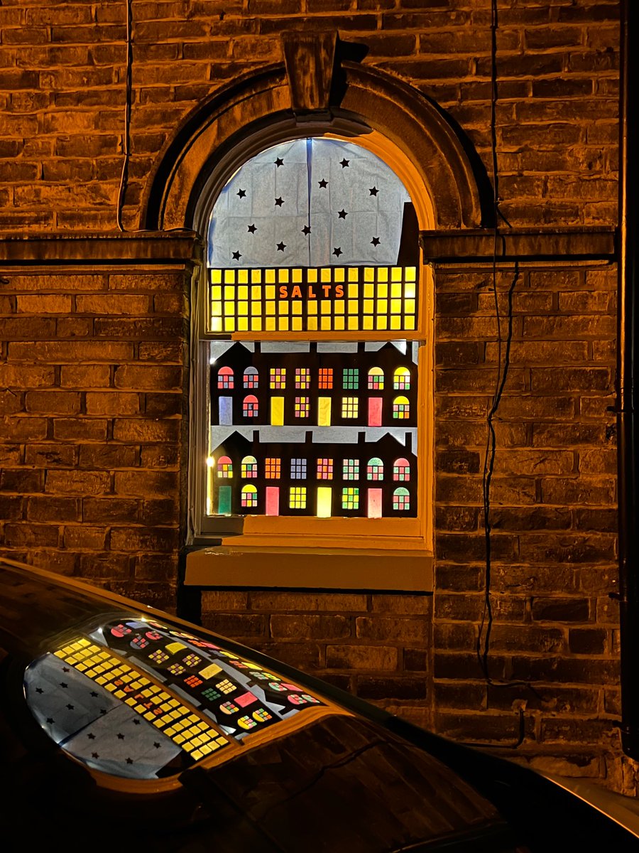 The #Saltaire Advent Calendar on #XmasEve at 5 Mawson St. Named after William Mawson, an architect of the mill &amp; the tiny homes. With Henry Lockwood he also designed Bradford Wool Exchange &amp; City Hall,  which were painted for the postcard market &amp; sent all over the world.