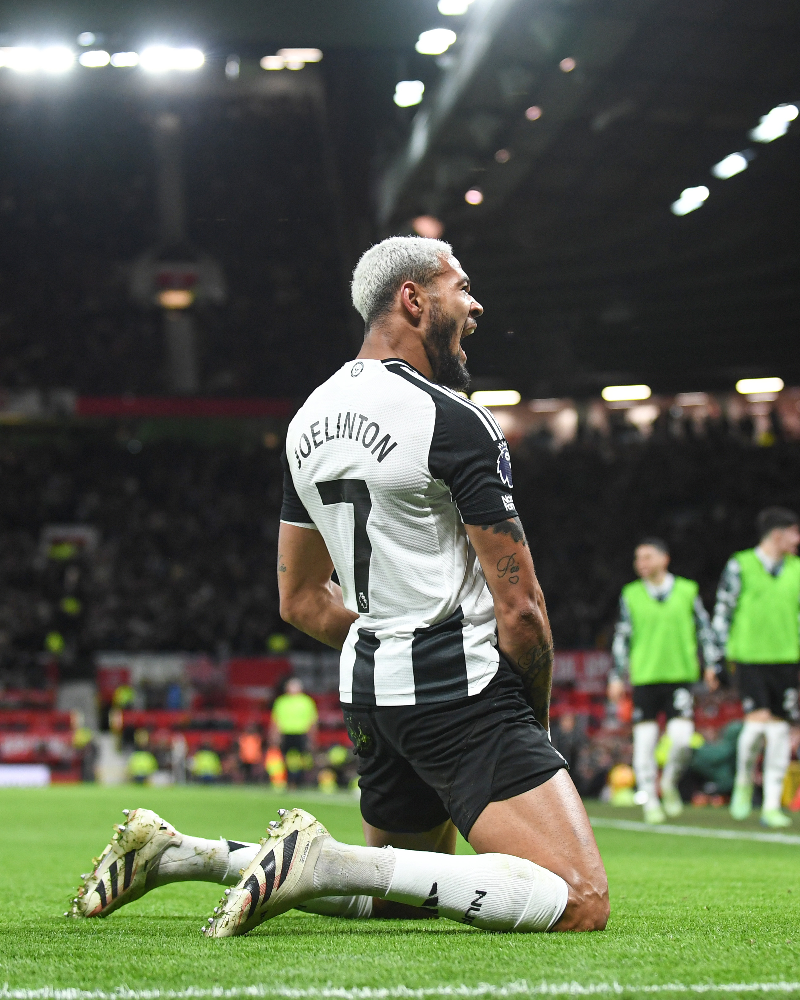Joelinton celebrates making it 0-2 at Old Trafford