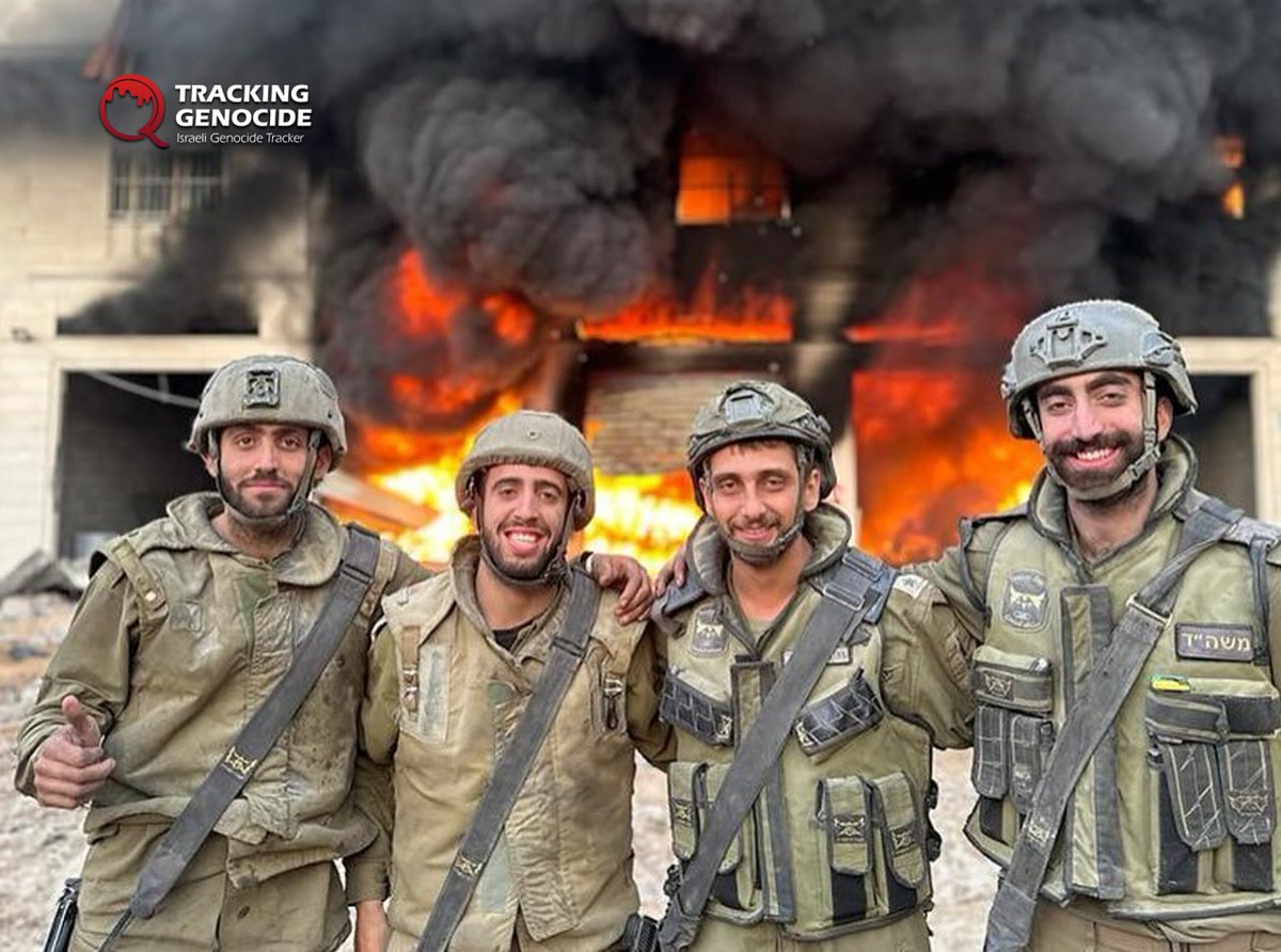 trackingisrael's tweet photo. Israeli soldiers from the 52nd Armored Battalion posed in front of shops and residential towers they set ablaze during their invasion of Gaza City. https://t.co/qjd9gpVkKs