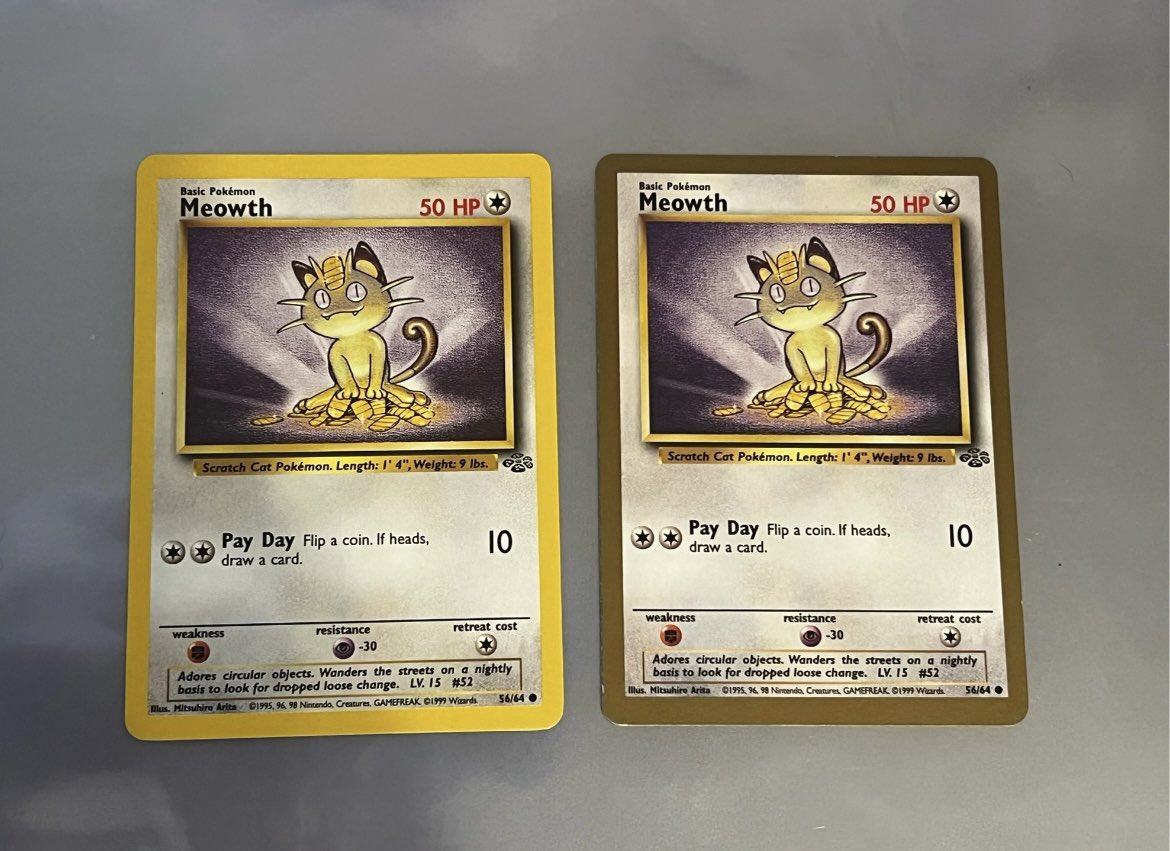 still looking through it but there's a gold border meowth (normal meowth  on the left for comparison)