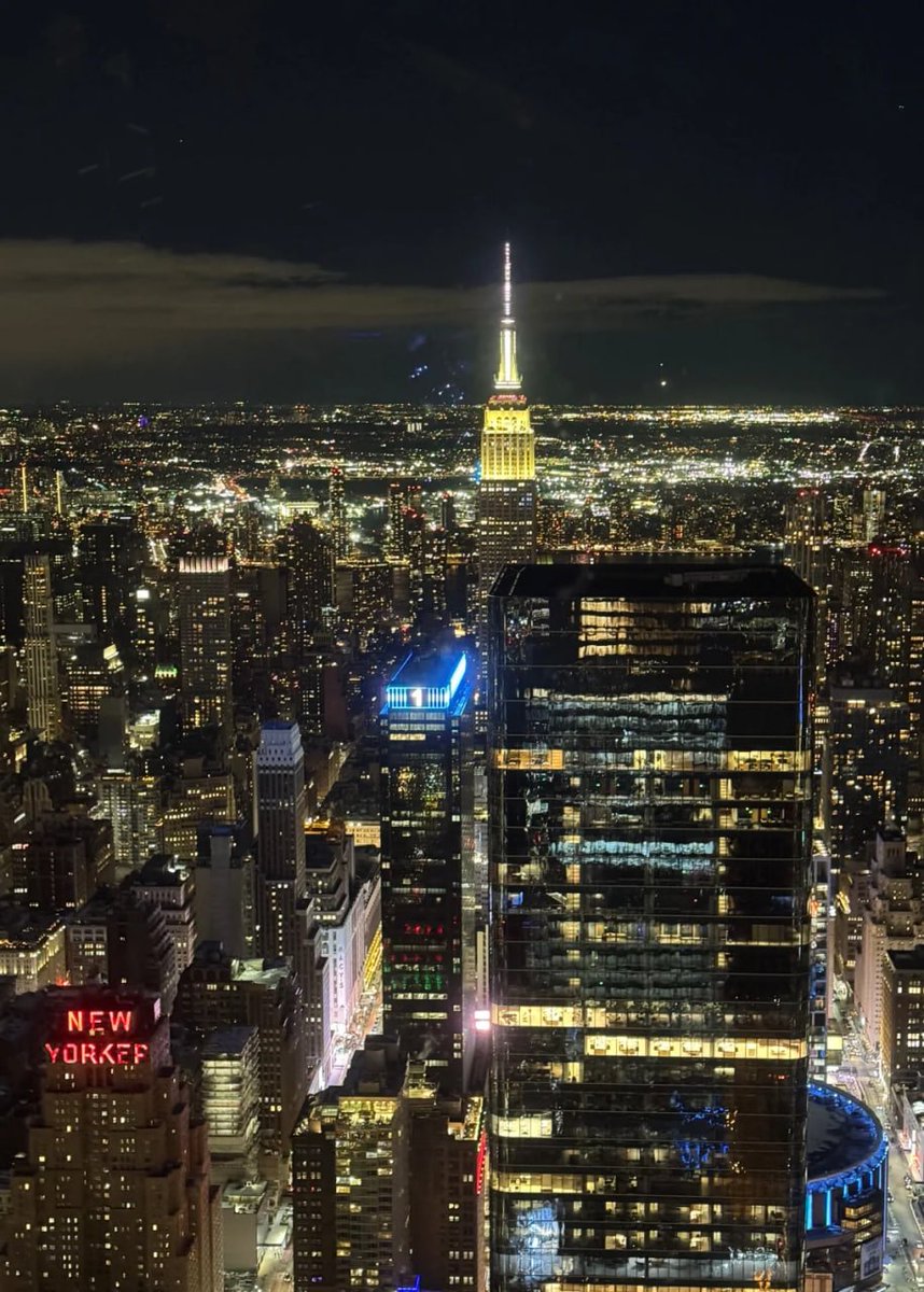 Capture the dazzling night sky of the city, a feast of lights and architecture