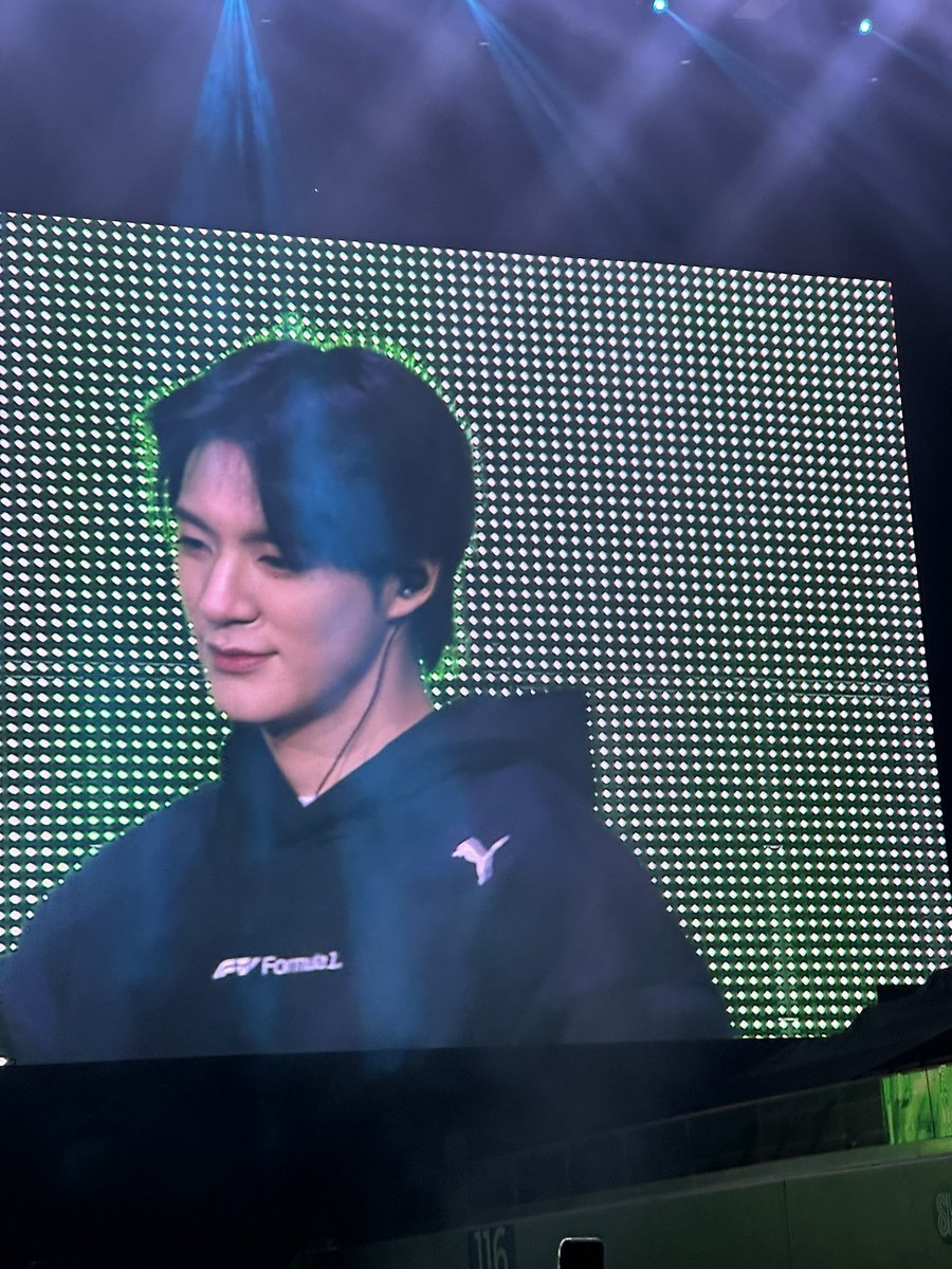 jeno with his favorite team jacket, also f1 x puma hoodie