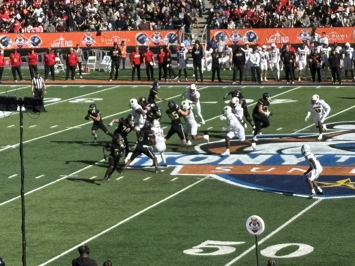 Taking in the Sun Bowl with Greyson!