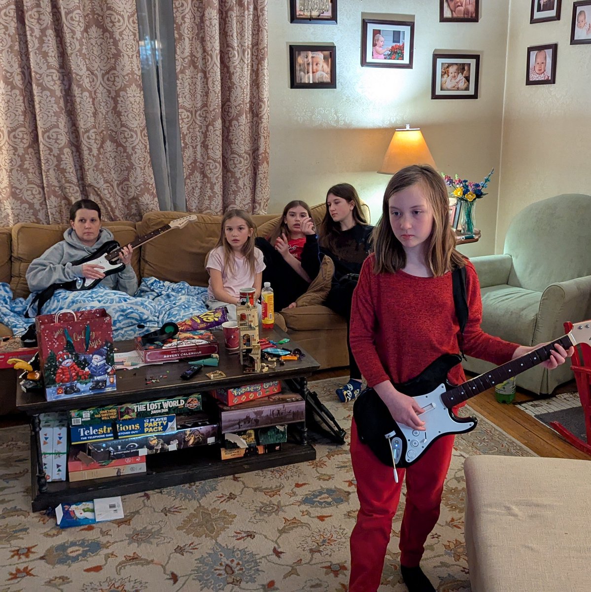 Our New Year's Eve tradition is to play Rock Band together as a family. There are only two guitars but a room full of singers, especially when Journey comes on.