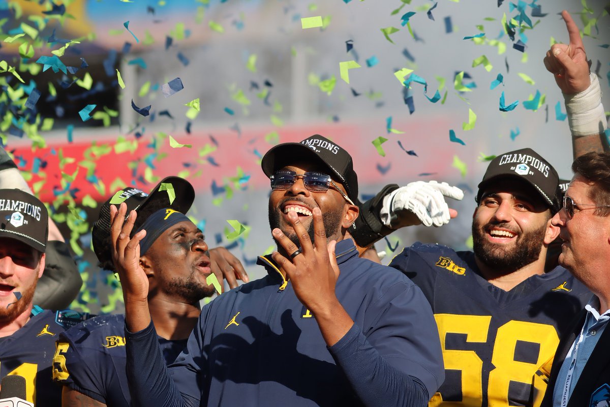 Michigan finishes its season with maize and blue confetti raining down on them