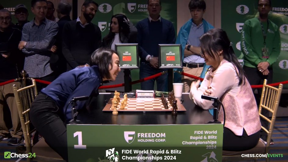 chess24com's tweet photo. Lei Tingjie and Ju Wenjun have a friendly chat before their Final match! We are guaranteed to have a Chinese women's world blitz champion.

#RapidBlitz https://t.co/xs5uF4Zwx9