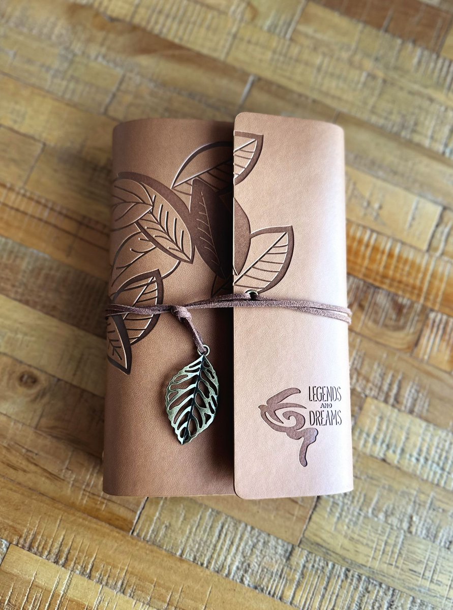 Legends &amp; Dreams Journal Travel Notebook - Brown 
Introducing the Legends &amp; Dreams Traveler's Journal – a beautifully crafted notebook that blends elegance with functionality, perfect for note-takers, writers, travelers, and dreamers alike. The journal is wrapped in a soft, im...
