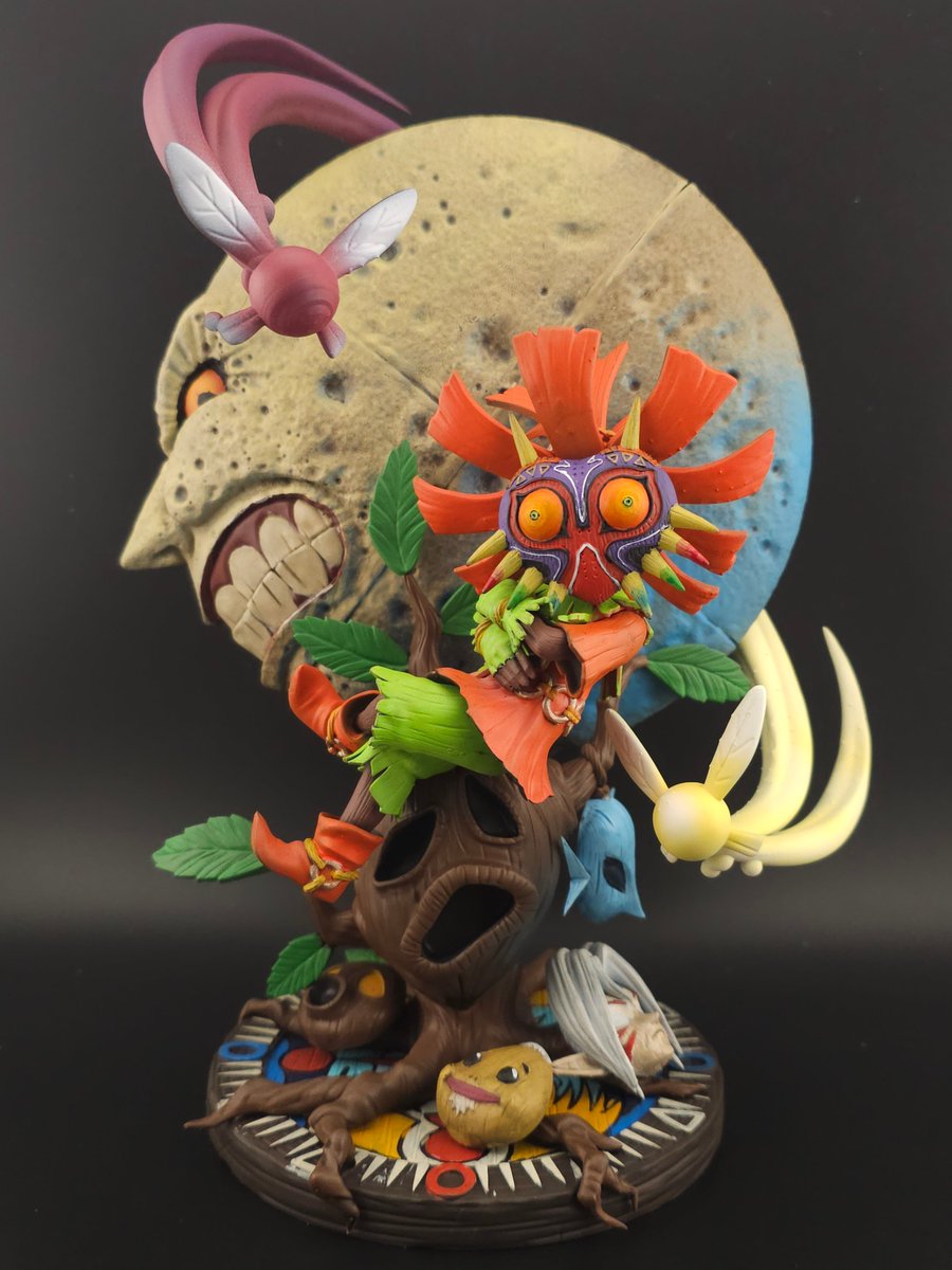 The Legend of Zelda: Majora's Mask

Happy new year! This was one of my longer paint jobs just due to how many separate colors and pieces were involved. I experimented with some colored shadows on this and love how the effect came out on the moon.