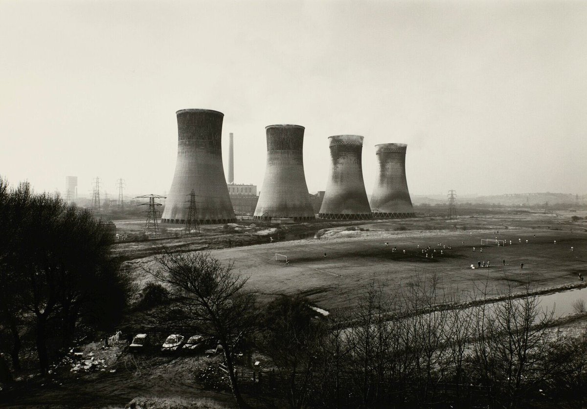 Bertrom's tweet image. Cooling towers in photography.

Michael Kenna, ‘Ratcliffe Power Station, Study 26, Nottinghamshire, England’.
1986.

John Davies, ‘Agecroft Power Station’, 1983.

Shirley Baker, ‘Cooling towers through the rooftops’, Salford, 1962.

Marc Riboud, Leeds,
1953.