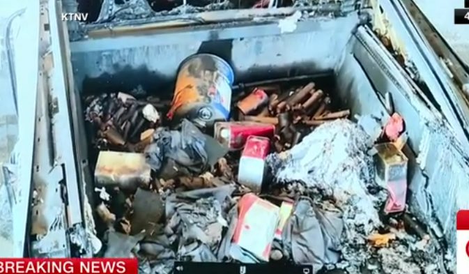 A picture showing the trunk of the Cybertruck involved in the Las Vegas explosion, containing various materials, including what appear to be gas tanks and other incendiary items