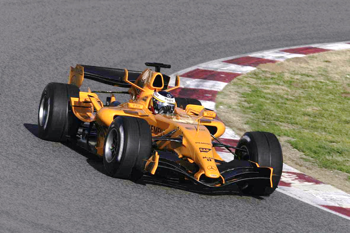 Wading through CD (!) photo archive. Found these 2006 shots of an orange (pre-Papaya) <a href="/McLarenF1/">McLaren Mastercard Formula 1 Team</a> MP4-20 in a race bay. Then <a href="/PedrodelaRosa1/">Pedro de la Rosa</a> testing an early MP4-21 at <a href="/Circuitcat_eng/">Circuit de Barcelona-Catalunya</a>. Gorgeous cars, very handy driver. (No pic credit but most likely LAT.) #F1