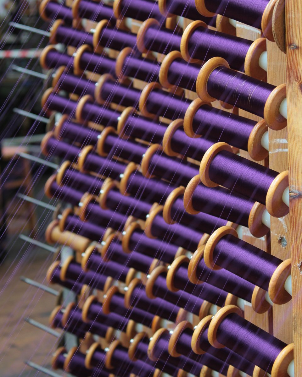 Gainsweaving's tweet photo. On the warping Creel: hundreds of silk organzine bobbins as they are wound into a luxurious warp ready for weaving.
#gainsboroughweaving
.
.
.
.
#makingluxury #craftmanship #artisianal #weaveshed #millfloor #weavingluxury #interiordesigner #interiordesign #luxuryinteriors https://t.co/x2hZultHwr