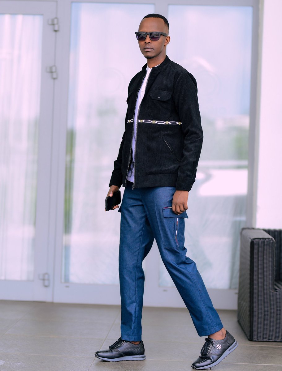 FabRugumire's tweet image. Confidence isn’t just an attitude; it’s a lifestyle. Walking into the new year with purpose and style! 💼✨ 

#NewYearVibes #EleganceInMotion #MadeInRwanda