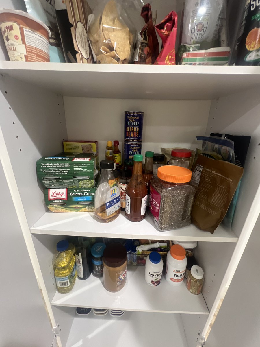 jamiegaul's tweet photo. I asked my husband if we had refried beans in the cupboard, he said no. So I bought more at the store. Curious if any other men see the refried beans in this photo? https://t.co/Nc3QFy0E6b