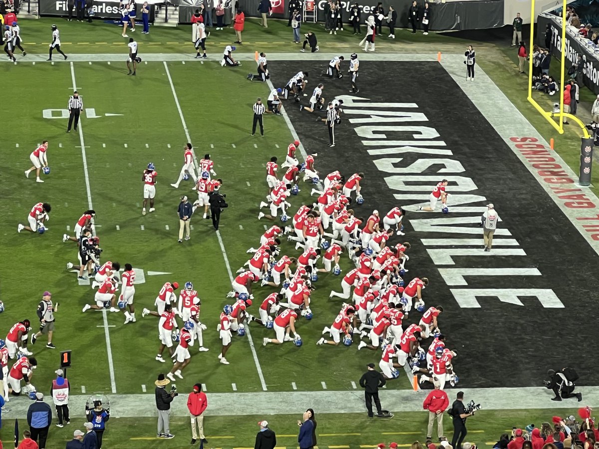 What a scene. 

Ole Miss players praying prior to the kickoff of the Gator Bowl. 

#OleMiss