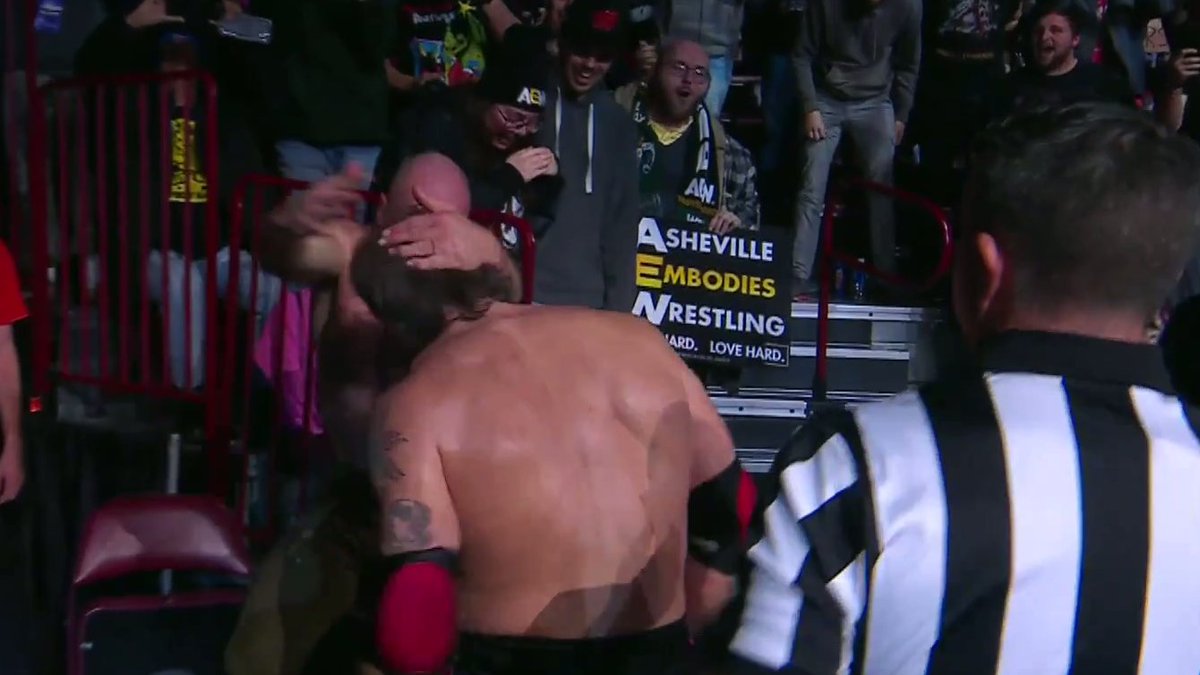 matzimazing's tweet photo. #AEWDynamite in Asheville NC was a fantastic show! Thank you to everyone who made it possible. I was the most excited to see Hangman Adam Page. 
I got lots of compliments on my sign, and I stand firmly when I say: 
Asheville 
Embodies 
Wrestling 
Fight hard. Love hard. https://t.co/kSZZJ0gPnN