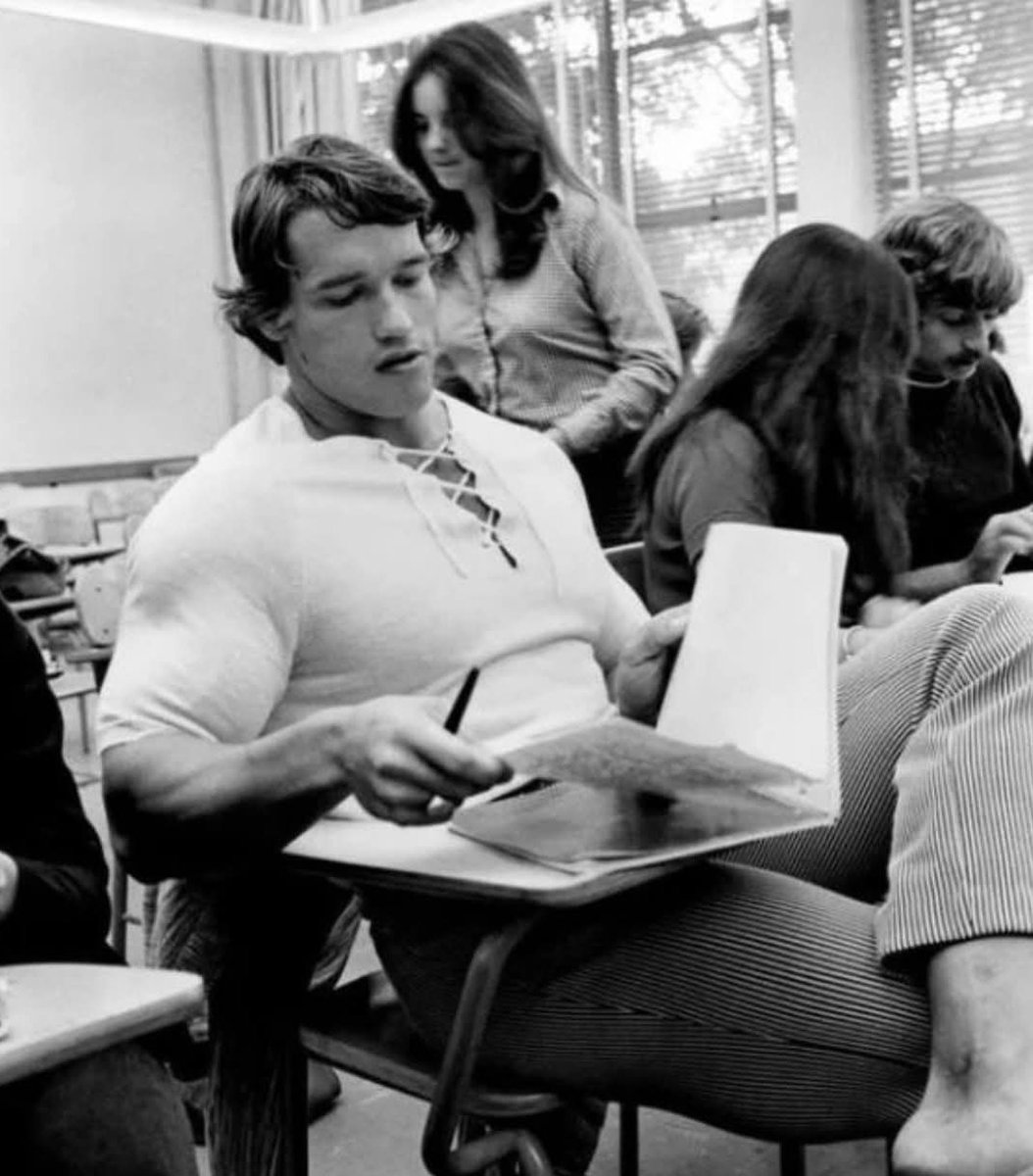 Dr_TheHistories's tweet photo. In 1973, Arnold Schwarzenegger, still rising as a bodybuilding champion, was laying the groundwork for a future beyond fitness. A photograph from that year shows him attending night school in California, studying business and English to prepare for broader success. Despite his growing fame, Schwarzenegger prioritized education, showcasing his commitment to long-term goals and self-improvement.  

As an immigrant from Austria, he faced challenges like a language barrier and cultural adjustments but used education as a tool to overcome them. This phase of his life demonstrated his work ethic and vision, setting the stage for his success as an actor, entrepreneur, and politician.

#drthehistories