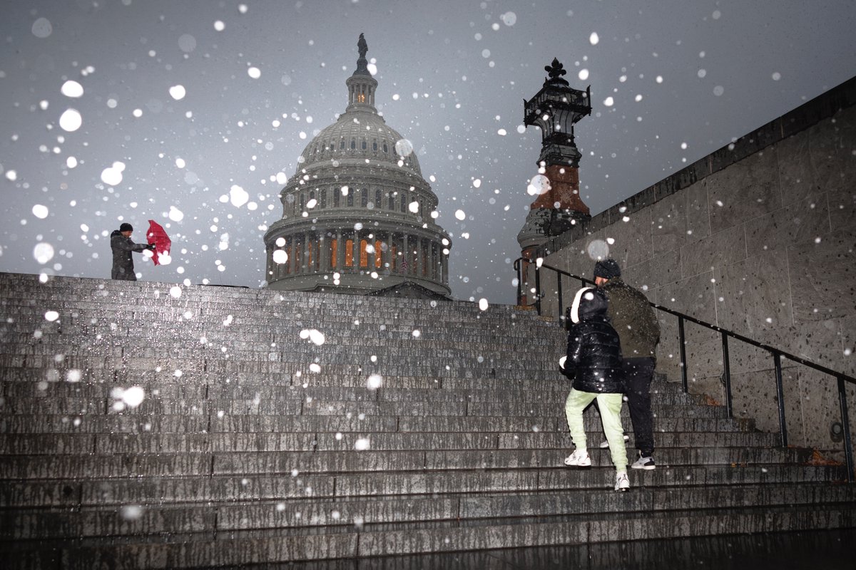 Snowfall over Capitol Hill.