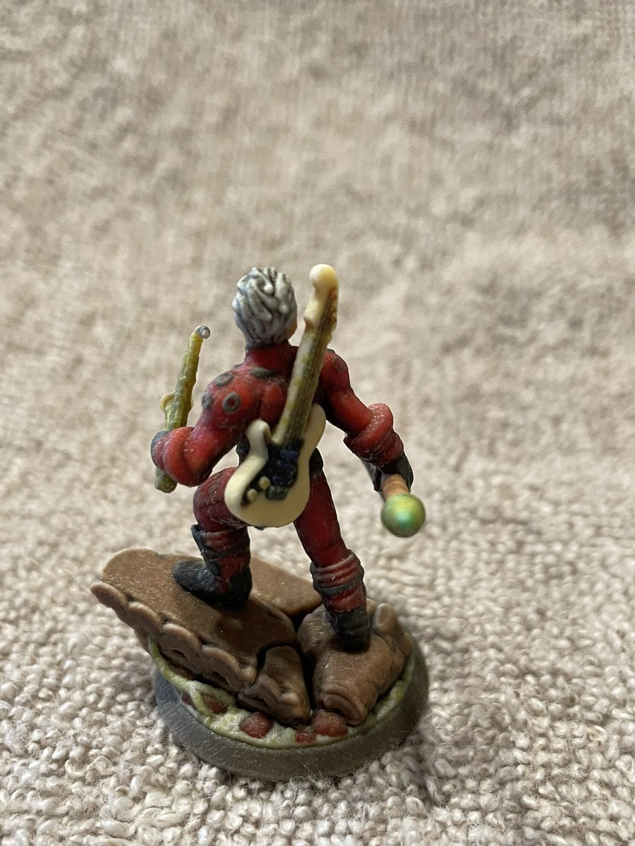 My family gave me this custom Warhammer figure of me, equipped with battle axe, saxophone and guitar. For Sanguinius!!!
