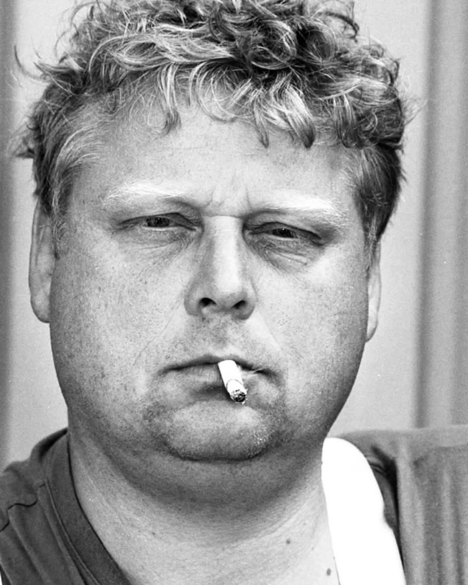 This image of Theo van Gogh was taken in 2004, the year he was tragically murdered. Theo was related to Vincent van Gogh, being the great-grandson of Vincent's brother. On November 2, 2004, he was killed by an extremist who was angered by Theo's movie "Submission," which