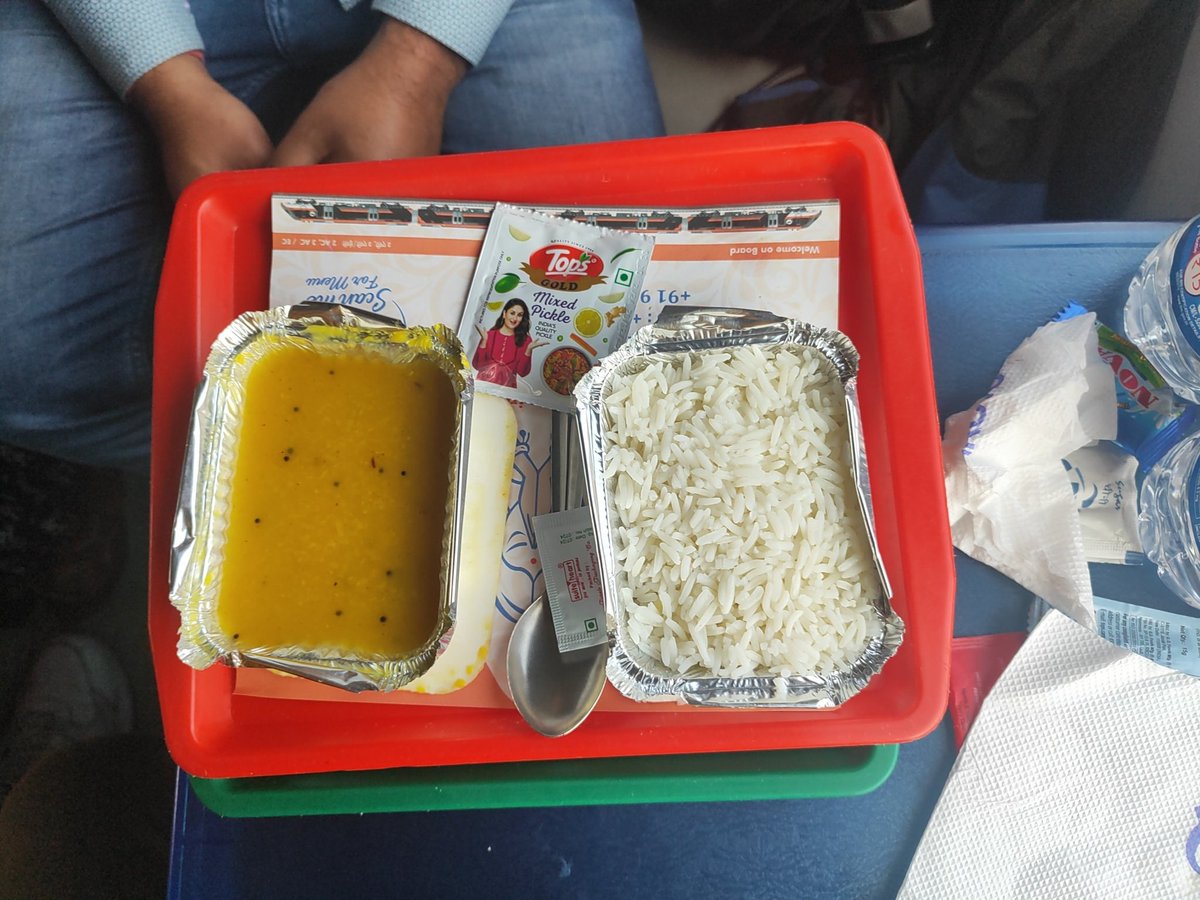 Train No 22812 BBS Rajdhani is running late above 3 hrs, but <a href="/RailMinIndia/">Ministry of Railways</a> <a href="/IRCTCofficial/">IRCTC</a> compensates passengers with Only Dal, Rice &amp; pickel. <a href="/RailMinIndia/">Ministry of Railways</a> we paid almost double fare + dynamic fare but you gives us dal &amp; rice like fool. <a href="/AshwiniVaishnaw/">Ashwini Vaishnaw</a> sir busy on marketing
