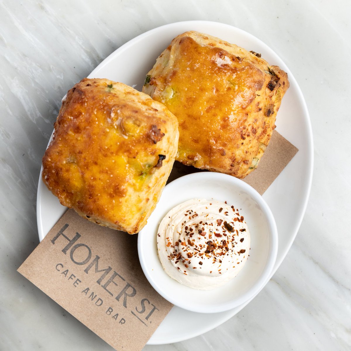 Fight the winter cold with the savoury goodness of our cheddar and scallion biscuits. A little holiday warmth in every bite.