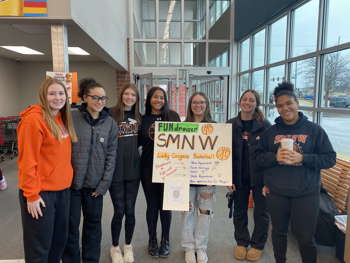The winter storm is on its way! ❄️ Stop by Hy-Vee on Shawnee Mission Parkway to stock up before it hits. Our Lady Cougars are here to sack groceries! Come grab your essentials, say hi, and support our Coogs! #DatWay