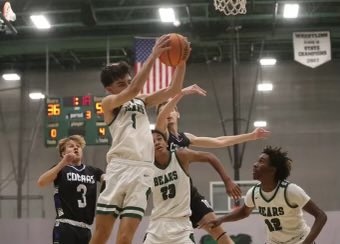 Behind the scenes work. Boxing out. Photo credit Naples Daily News.