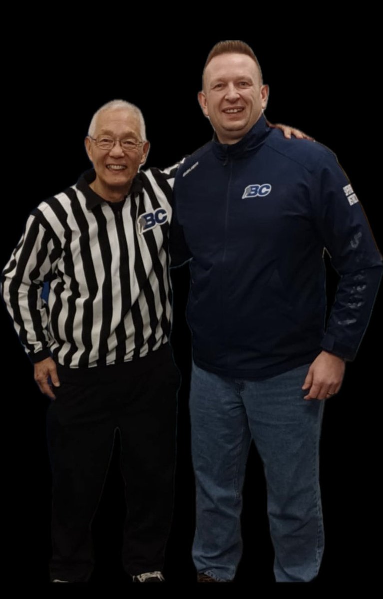 BCHockey Officiating Mentor Trevor Seibel is welcomed to Rogers Rink Saturday afternoon by Salmon Arm’s ‘Mr. Hockey’ Roy Sakaki prior to Roy’s first puck drop during BCHockey’s Officiating Mentorship Weekend in the North Okanagan Region #morethandroppingpucks
