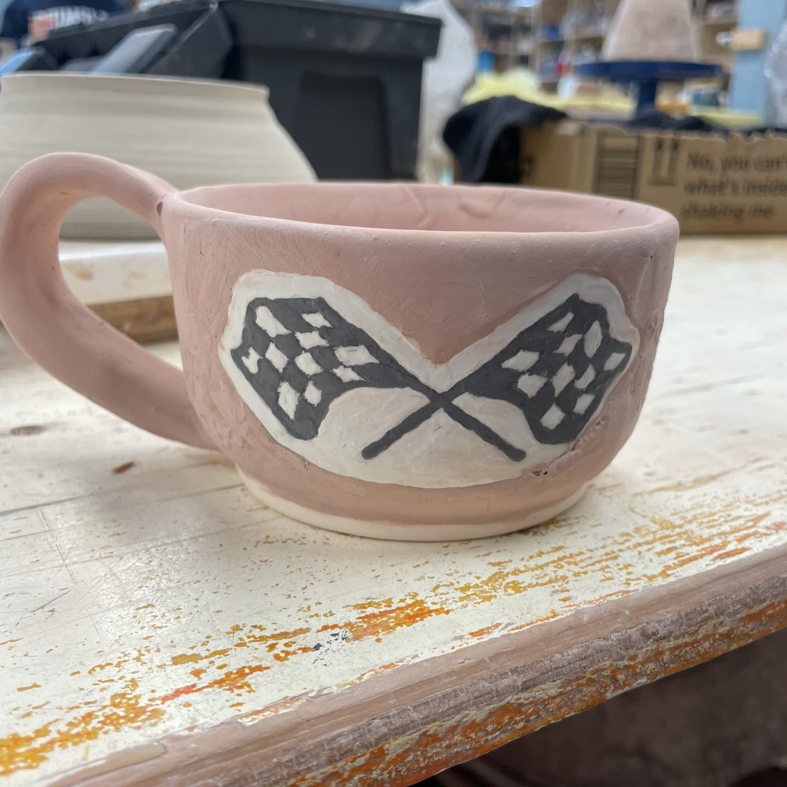 fire_pottery's tweet image. This was my first attempt last year of painting a racing flag design 🏁 I’ve learned a lot about using glazes in combination with one another! It’s discernible enough, right?
#ceramics #nascar #custom #pottery